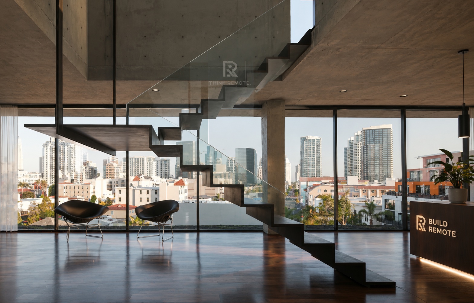 The Build Remote entry — floating staircase, reception desk and the San Diego skyline